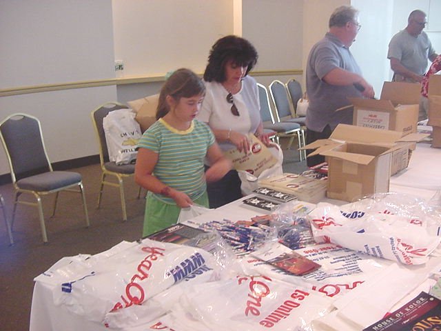 Photo of Alison helping with goodie bags