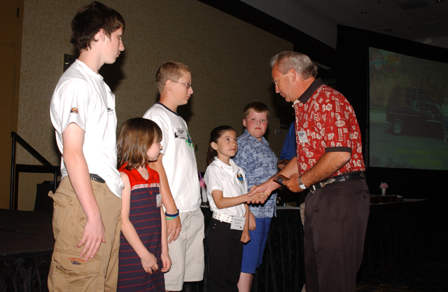 Junior judges receive their awards.